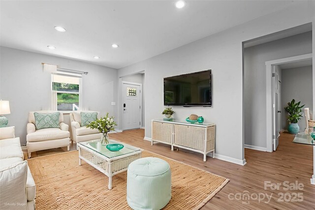 146 Georgia St SW, Concord, NC 28025 - living area featuring recessed lighting and wood finished floors