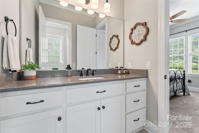 9125 Dylan Ridge Ct, Concord, NC 28027 - bathroom with vanity, connected bathroom, and a ceiling fan