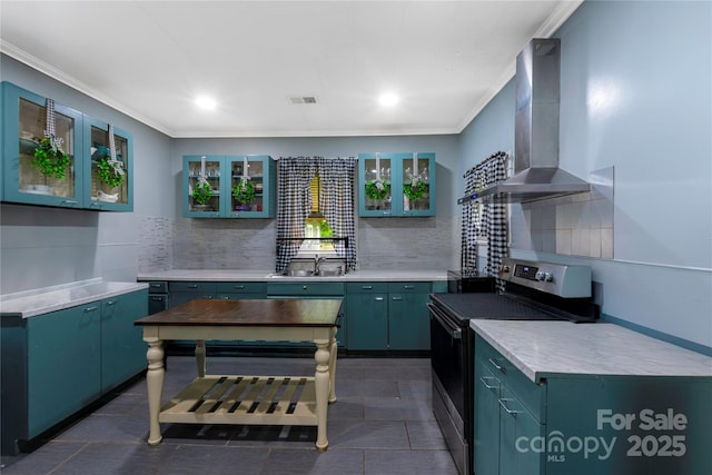 224 E Steele St, Salisbury, NC 28144 - kitchen with electric stove, wall chimney exhaust hood, tasteful backsplash, ornamental molding, and a sink