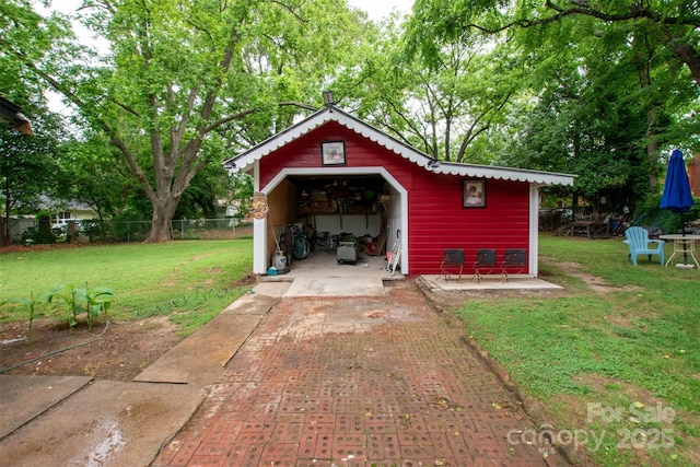 224 E Steele St, Salisbury, NC 28144 - view of outbuilding featuring driveway