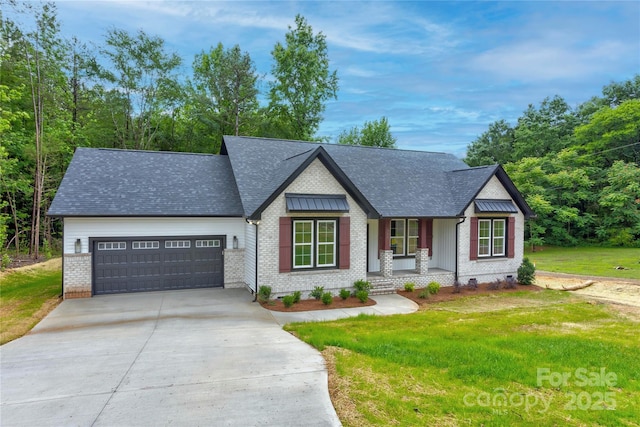 501 Old Speedway Dr NW Unit 1, Concord, NC 28027 - view of front facade with covered porch, an attached garage, concrete driveway, brick siding, and a front yard