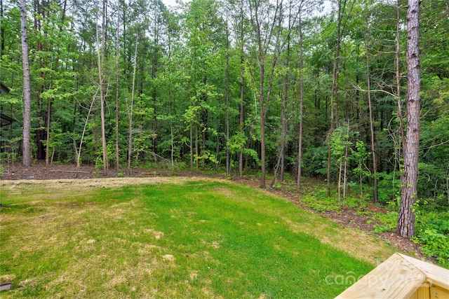 501 Old Speedway Dr NW Unit 1, Concord, NC 28027 - view of green lawn with a wooded view