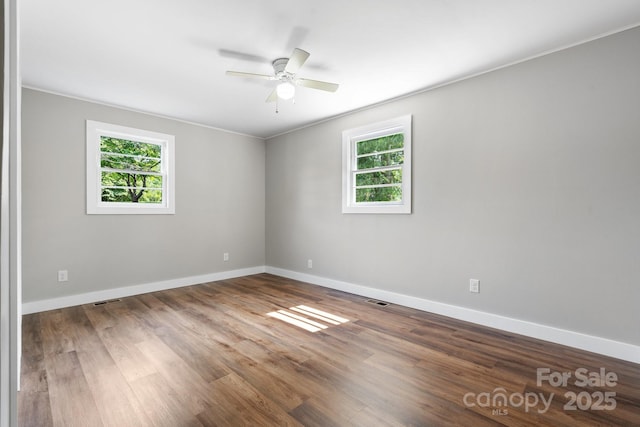 73 20th Ave SW, Hickory, NC 28602 - empty room with a ceiling fan, baseboards, wood finished floors, and ornamental molding
