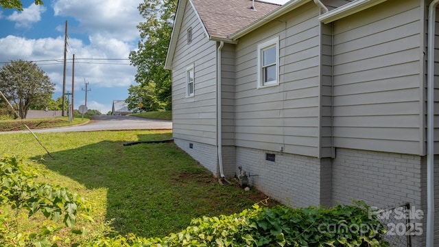 73 20th Ave SW, Hickory, NC 28602 - view of property exterior featuring a lawn, crawl space, and roof with shingles