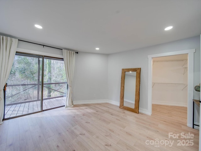 2143 Manawa Ln, Tega Cay, SC 29708 - empty room featuring light wood-type flooring, baseboards, and recessed lighting