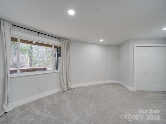 2143 Manawa Ln, Tega Cay, SC 29708 - carpeted empty room featuring baseboards and recessed lighting