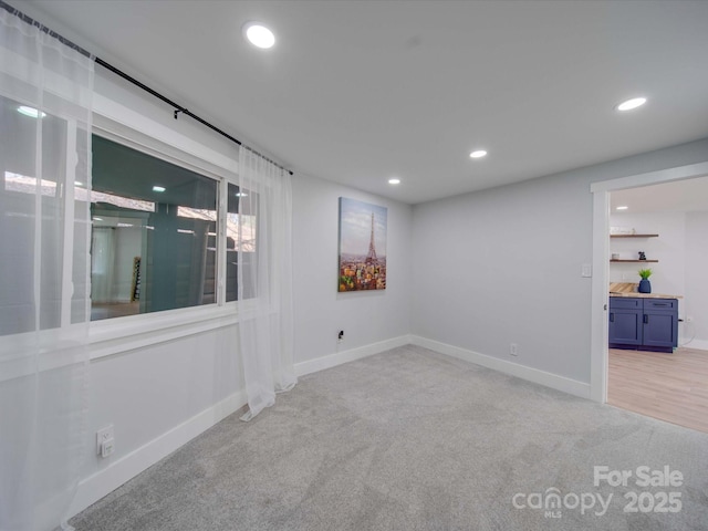 2143 Manawa Ln, Tega Cay, SC 29708 - spare room featuring carpet flooring, recessed lighting, and baseboards