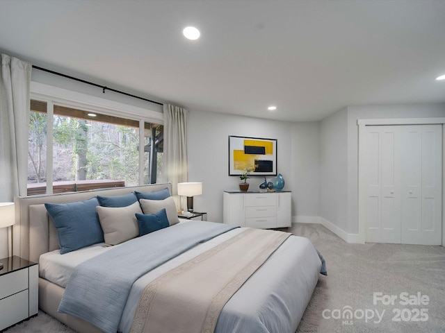 2143 Manawa Ln, Tega Cay, SC 29708 - bedroom featuring recessed lighting, light colored carpet, a closet, and baseboards