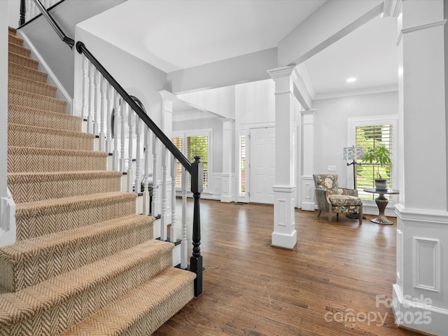 2821 Providence Spring Ln, Charlotte, NC 28270 - foyer with ornate columns, stairway, dark wood-type flooring, ornamental molding, and recessed lighting