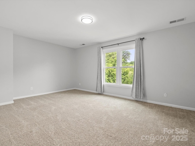 2821 Providence Spring Ln, Charlotte, NC 28270 - carpeted spare room featuring baseboards