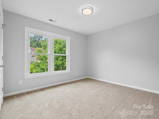 2821 Providence Spring Ln, Charlotte, NC 28270 - carpeted spare room featuring baseboards