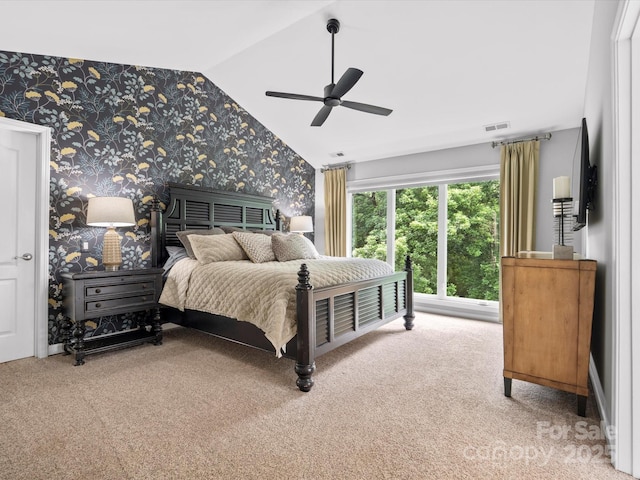2821 Providence Spring Ln, Charlotte, NC 28270 - carpeted bedroom featuring wallpapered walls, lofted ceiling, and a ceiling fan