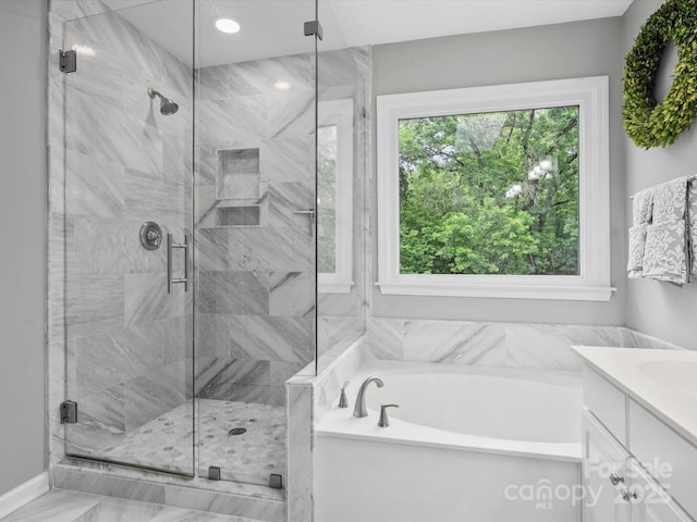 2821 Providence Spring Ln, Charlotte, NC 28270 - bathroom featuring a garden tub, a marble finish shower, and vanity