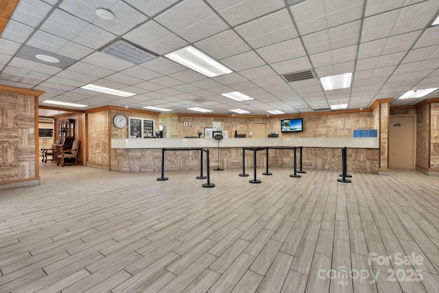 9550 Shore Dr Unit 930, Myrtle Beach, SC 29572 - miscellaneous room with a paneled ceiling, wooden walls, and wood finished floors