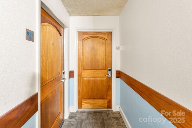 9550 Shore Dr Unit 930, Myrtle Beach, SC 29572 - doorway to outside featuring a textured ceiling