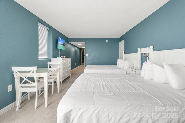 9550 Shore Dr Unit 930, Myrtle Beach, SC 29572 - bedroom with wood finished floors