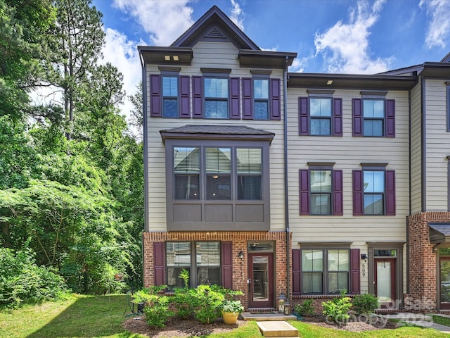 513 Cubitt Ct, Charlotte, NC 28205 - townhome / multi-family property featuring brick siding