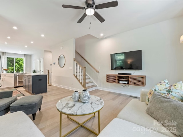 513 Cubitt Ct, Charlotte, NC 28205 - living room with light wood-style floors, stairs, recessed lighting, a ceiling fan, and baseboards