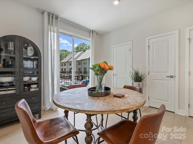 513 Cubitt Ct, Charlotte, NC 28205 - dining room with light wood finished floors