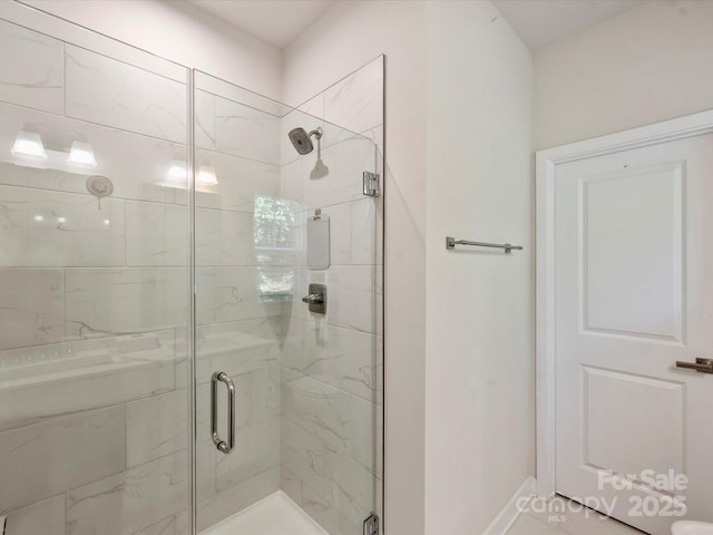 513 Cubitt Ct, Charlotte, NC 28205 - full bathroom featuring a stall shower and baseboards