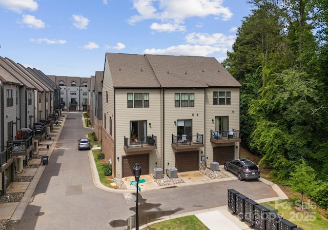 513 Cubitt Ct, Charlotte, NC 28205 - back of house with central AC unit