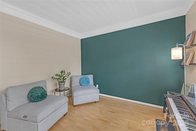 12303 Shadow Ridge Ln, Charlotte, NC 28273 - living area featuring crown molding, wood finished floors, and baseboards