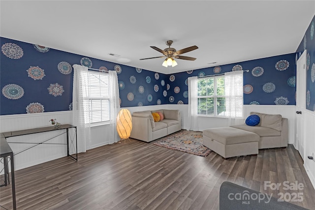 12303 Shadow Ridge Ln, Charlotte, NC 28273 - living room featuring wallpapered walls, a wainscoted wall, wood finished floors, and a ceiling fan