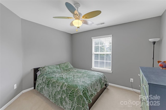 12303 Shadow Ridge Ln, Charlotte, NC 28273 - bedroom with light carpet, baseboards, and ceiling fan