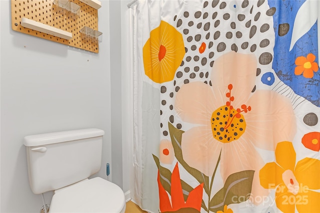 12303 Shadow Ridge Ln, Charlotte, NC 28273 - bathroom with toilet and a shower with shower curtain