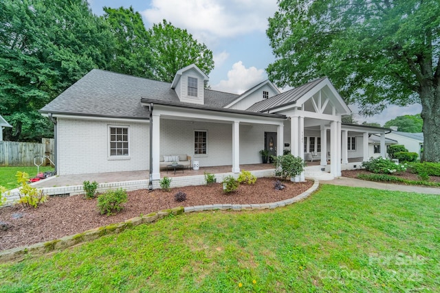 1121 S Wendover Rd, Charlotte, NC 28211 - view of front facade with brick siding and roof with shingles