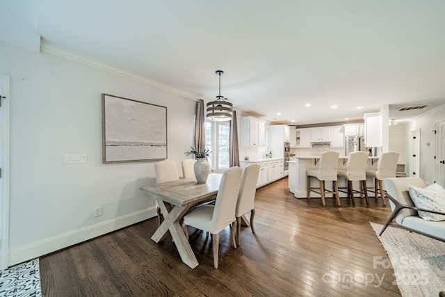 1121 S Wendover Rd, Charlotte, NC 28211 - dining room with ornamental molding, dark wood-style floors, recessed lighting, and baseboards
