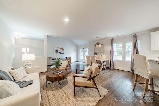 1121 S Wendover Rd, Charlotte, NC 28211 - living area with ornamental molding, wood finished floors, baseboards, and lofted ceiling