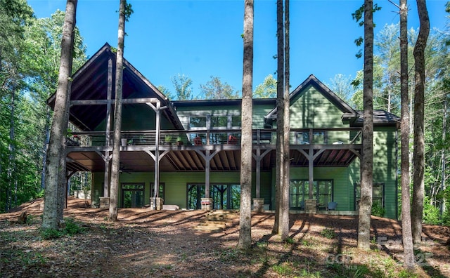 1003 Glory Dr Unit 60, Morganton, NC 28655 - back of house featuring a deck and a carport
