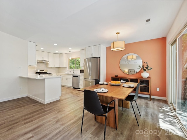 3531 Bon Rea Dr, Charlotte, NC 28226 - dining room with light wood-style floors, baseboards, and recessed lighting
