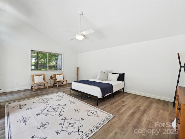 3531 Bon Rea Dr, Charlotte, NC 28226 - bedroom with wood finished floors, vaulted ceiling, baseboards, and a ceiling fan