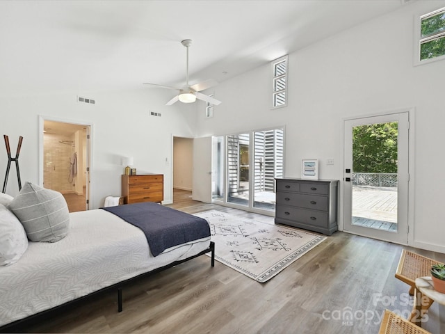3531 Bon Rea Dr, Charlotte, NC 28226 - bedroom featuring access to exterior, a towering ceiling, wood finished floors, connected bathroom, and a ceiling fan