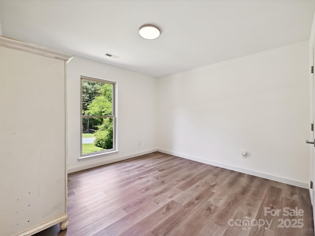 3531 Bon Rea Dr, Charlotte, NC 28226 - unfurnished room with wood finished floors and baseboards