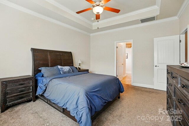 141 Tall Fern Loop, Mooresville, NC 28117 - bedroom with light colored carpet, crown molding, a raised ceiling, a ceiling fan, and baseboards