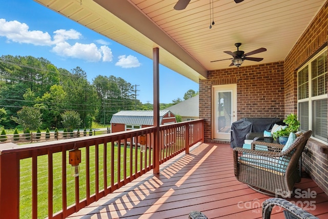 141 Tall Fern Loop, Mooresville, NC 28117 - deck with a ceiling fan and an outbuilding