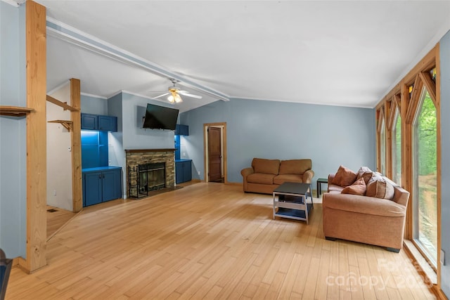 42 Evita Cove Rd, Weaverville, NC 28787 - living room featuring light wood-style flooring, plenty of natural light, a stone fireplace, and ceiling fan