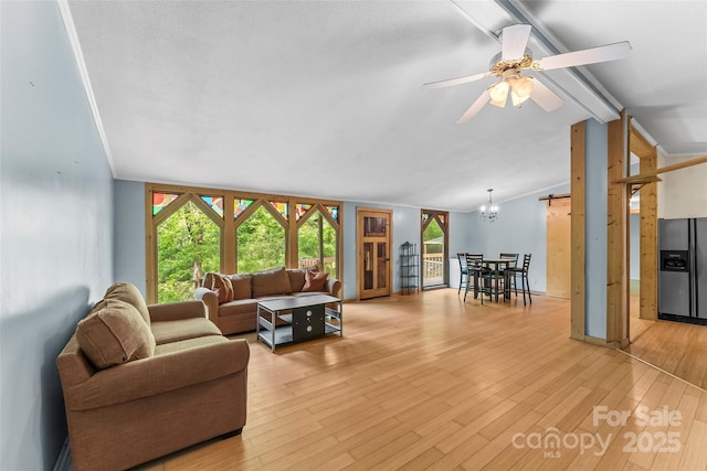 42 Evita Cove Rd, Weaverville, NC 28787 - living area with light wood-style flooring, a chandelier, and a ceiling fan