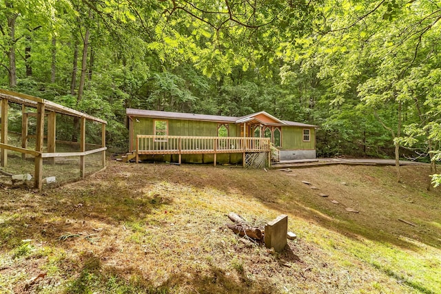 42 Evita Cove Rd, Weaverville, NC 28787 - back of property with a view of trees and a deck