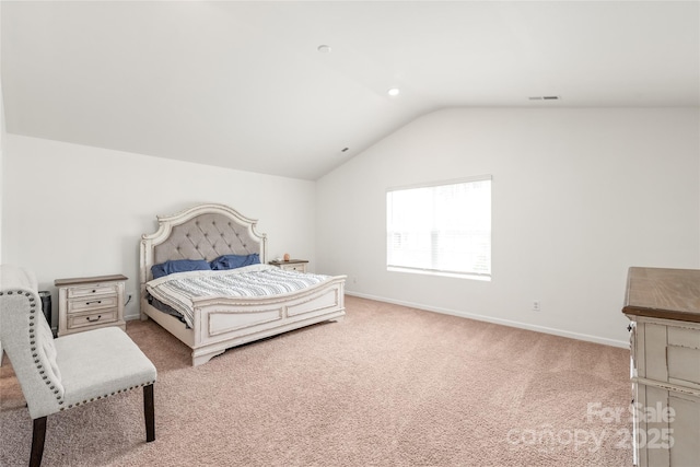 2340 Lanza Dr, Charlotte, NC 28215 - bedroom featuring lofted ceiling, carpet, and baseboards