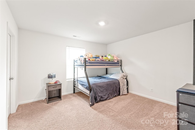 2340 Lanza Dr, Charlotte, NC 28215 - bedroom featuring carpet flooring and baseboards