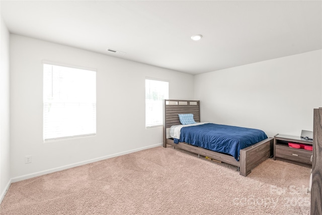2340 Lanza Dr, Charlotte, NC 28215 - carpeted bedroom featuring baseboards