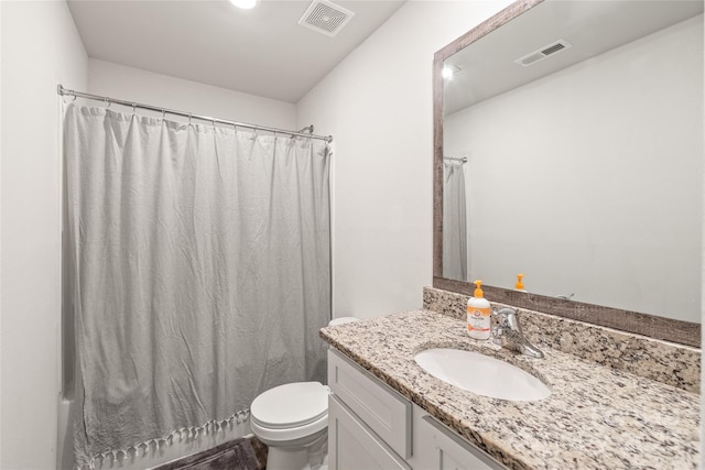 2340 Lanza Dr, Charlotte, NC 28215 - full bathroom with vanity, toilet, and shower / bath combination with curtain