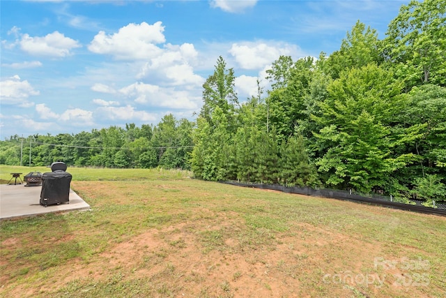 2340 Lanza Dr, Charlotte, NC 28215 - view of green lawn featuring a patio area