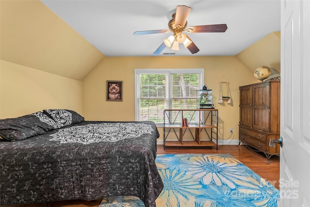 32 Evita Cove Rd, Weaverville, NC 28787 - bedroom with lofted ceiling, wood finished floors, and a ceiling fan