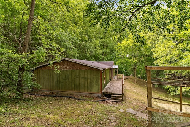 32 Evita Cove Rd, Weaverville, NC 28787 - view of yard featuring a wooden deck and a forest view