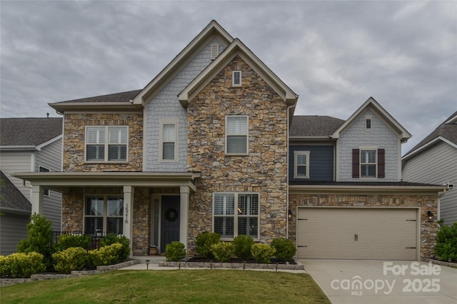 15216 Shallow Ridge Rd, Charlotte, NC 28278 - craftsman-style home featuring stone siding, concrete driveway, a front lawn, and a garage